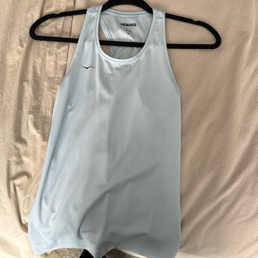 Hoka baby blue racerback top in size small